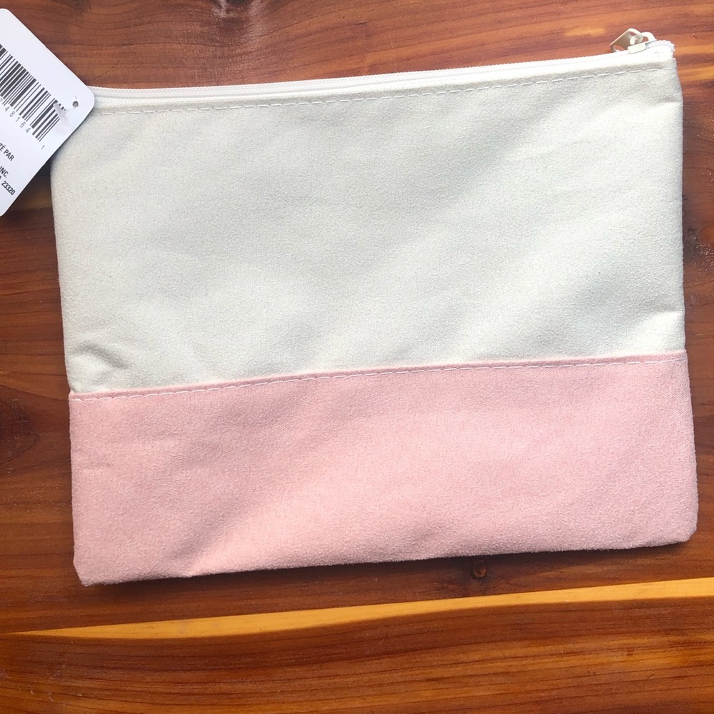 Pink and white cosmetic bag